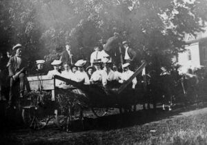 Academy students on a hayrack ride, circa 1910